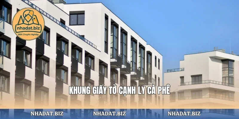Khung giấy tờ cạnh ly cà phê